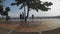 Man walk girl bike couple stretch at lake boardwalk. silhouettes