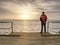 Man walk. Idyllic ocean beautiful dark cloud endless horizon