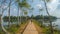 A Man walk on the path through the Great Lake at Angkor Thom Temple