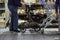 Man with a walker for elderly people shopping for groceries in a supermarket during coronavirus covid-19 pandemic