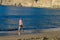 Man walking on the beach of Los Gigantes