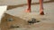 Man Walking On A Beach With Rock Pools