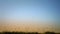 Man Walking in Blowing Grass Silhouette