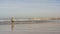 Man Walking on Cadiz Beach Spain