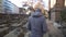 Man walking on cemetery, visiting grave of loved relative, feeling pain of loss