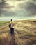 Man walking down country road