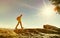 Man walking on the edge of a cliff