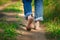 Man walking on footpath forest. Close-up of bare feet soiled with ground. healthy lifestyle.
