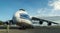 Man , walking in front of airplane An-124-100 (Russia\'s largest cargo plane in the world)