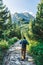 Man walking on hiking trail in Tatra mountains in Poland