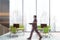 Man walking in panoramic open space office