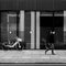 Man Walking Past Office Window Alone With Parked Lime Pedal Hire Bike Victoria Steet London