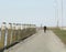 Man walking on the pier