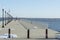 Man walking pier at Fort Taber Park