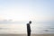 Man walking in solitude at the beach