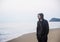 Man walking in solitude at the beach