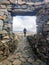 Man walking on the stone way in the Sicasumbre astronomic viewpoint. Fuerteventura