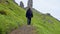 Man walking to the Old man of Storr