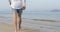 Man Walking To Water On Beach, Male Legs Closeup Back Rear View
