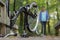 man walking towards broken down bicycle