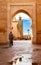 Man walking towards mosque in Marrakesh