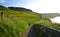 Man Walks Alone at the Coastline Footpath, UK