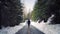 Man Walks On Road In Snowfall