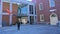 Man walks toward New Bedford Whaling Museum