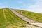 A Man Walks Up The Steps on Mount Trashmore