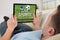 Man Watching Live Sports On Digital Tablet