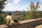 Man watching over Tuscan landscape in San Miniato, Italy