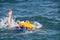 Man in water with life jacket on