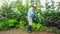 Man watering his plants