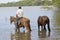 Man watering horses at Ometepe Island.