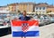 Man waving croatian flag in Rovinj town