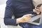 Man wear blue T-shirt jeans Hands using laptop smartphone and credit card