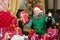 Man wear santa hat elf clothes celebrate christmas interior decorated fir tree and gifts. Christmas champagne drink. Man