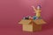 man wear shirt yellow and box, toy, game, basketball, headphones, polaroid box, smartphone, shoe, gamepad, in box, watch, on a