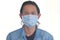 Man wearing a cloth mask protect himself from risk of disease, people prevent infection from coronavirus Covid-19 or Air pollution