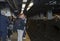 Man wearing head of horse waiting for train in Manhattan subway