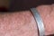 Man wearing magnetic therapy bracelet.