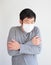 Man wearing mask get sick from corona virus, covid19 symptom as sneezing, cough, fever, body ache, breathing , pain