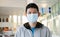Man wearing a medicine mask in business public area protect himself from risk of disease, people prevent infection from