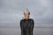 Man Wearing Snorkel And Mask Looking Away On Beach