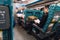 A man wearing suit reading and sitting in Taiwan High Speed Rail THSR in the morning in Taiwan, Taipei