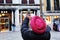 Man wearing Turban taking photo of clock tower in Piazza San Marco in Venice, Italy