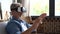 Man wearing VR headset. Handsome man resting use VR glasses. New technologies