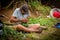 Man weaving baskets out of palm leaves