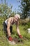 Man weeding in garden