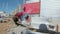 Man welder welds the parts of structure on Construction Site